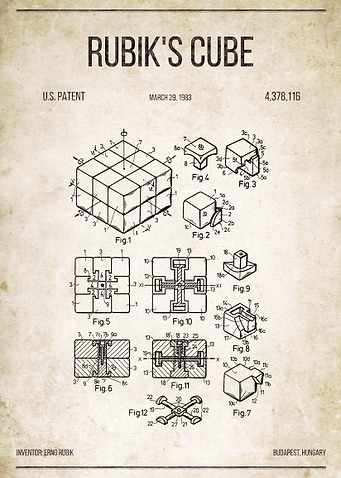 Rubik's Cube U.S. Patent #4,378,116 on old paper.