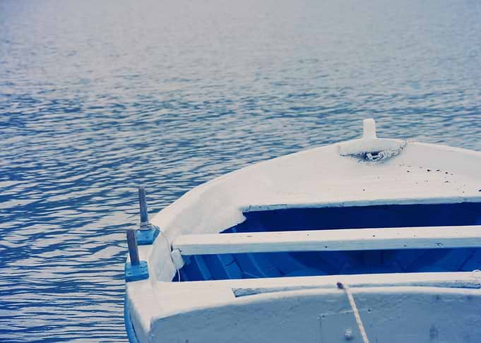 Blue boat at sea