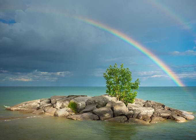 Rainbow at the beach after a large storm