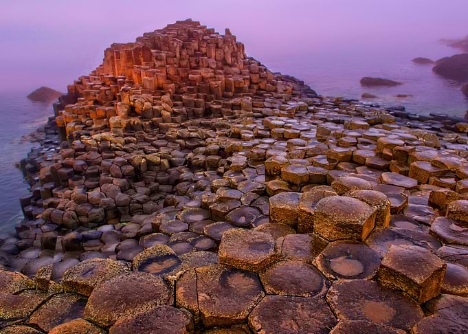 When the sun goes down at Giant's Causeway. Northern Ir ...