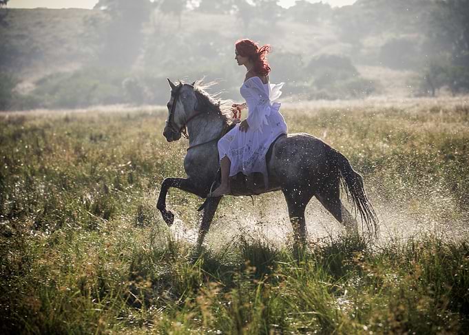 lovely redhead in the sunrise
