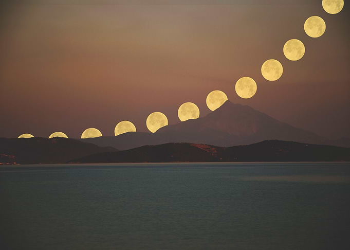 Precession of moon with mount Athos in foreground