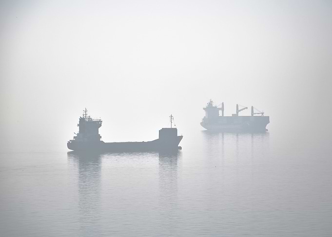 Two ships wait in the harbor of Thessaloniki