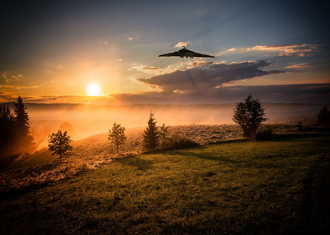The iconic Avro Vulcan Bomber over a misty landscape