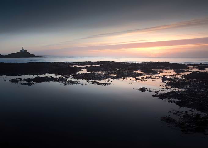 Early morning, big rockpools and Mumbles Lighthouse on ...