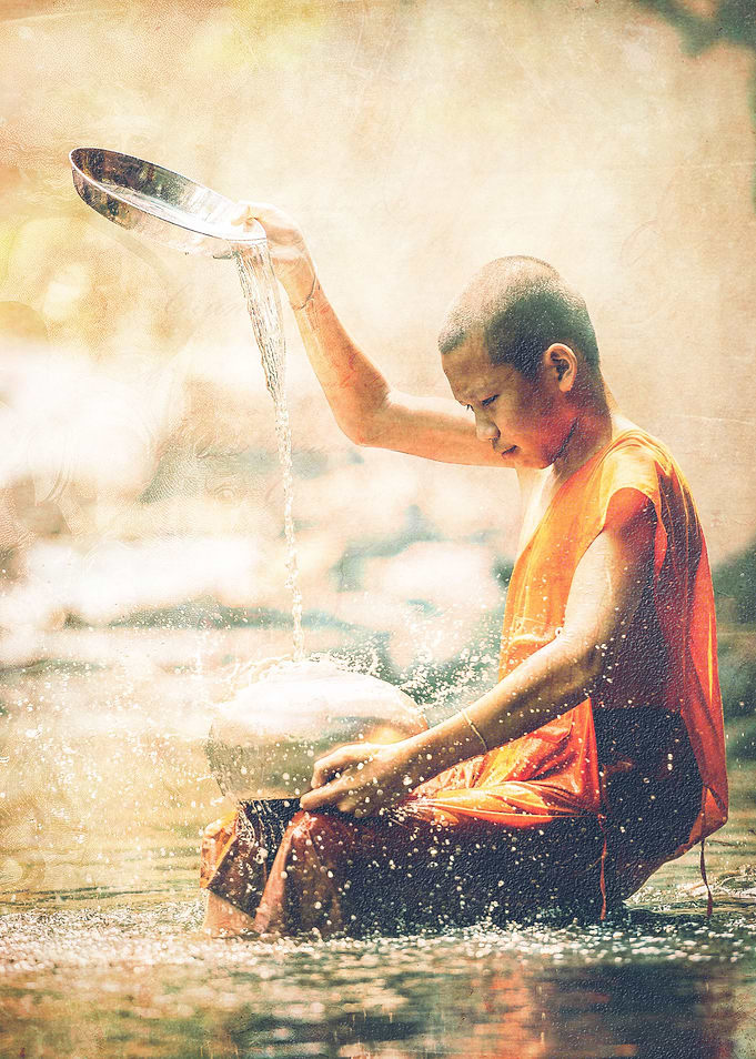 Vintage composition of a boy washing pots in river.