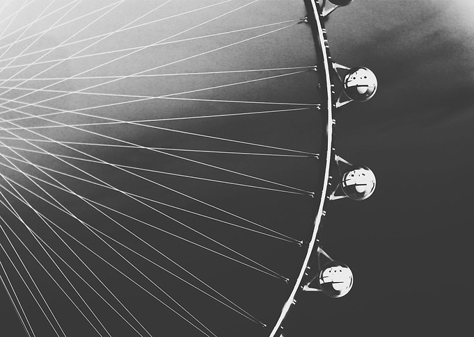 Ferris Wheel with sunset sky background in black and wh ...