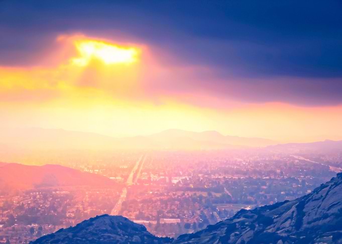 light of the sunset sky over the city in summer