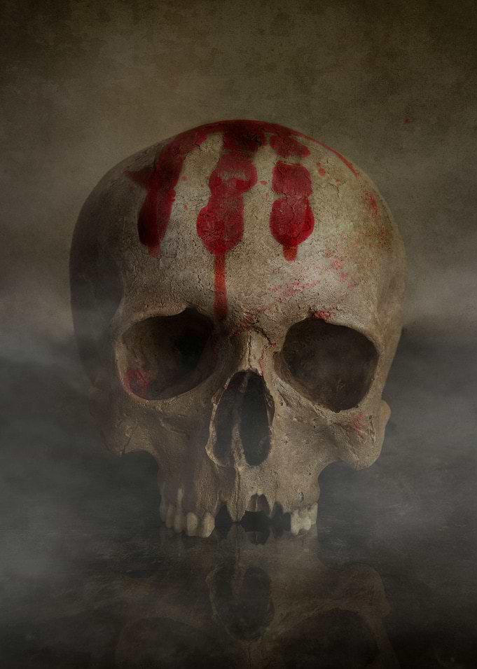 Male skull with bloody hand mark