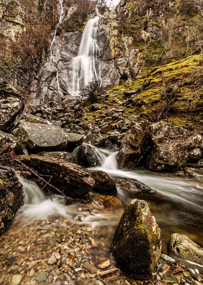 Aber Falls waterfall sits behind the village of Abergwy ...