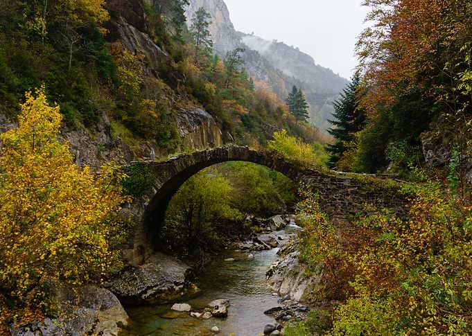 Medieval bridge on the Belagua river near Isaba in Nava ...