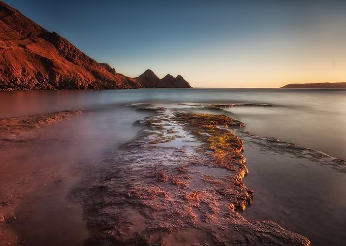 Incoming tide at the well known coastal beauty spot of ...