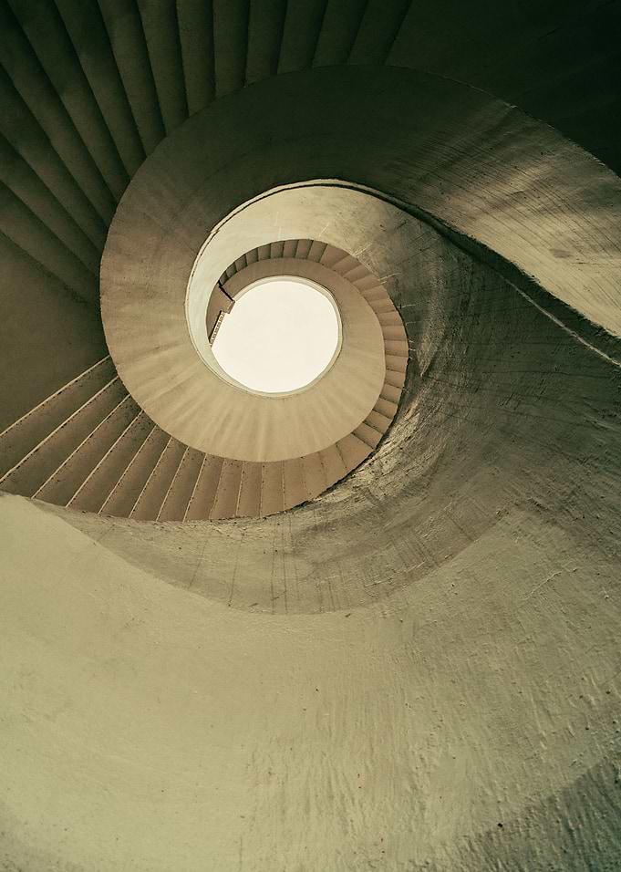 Spiral staircase in brown tones