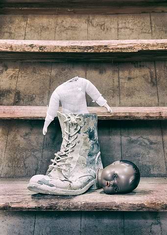 Old broken doll