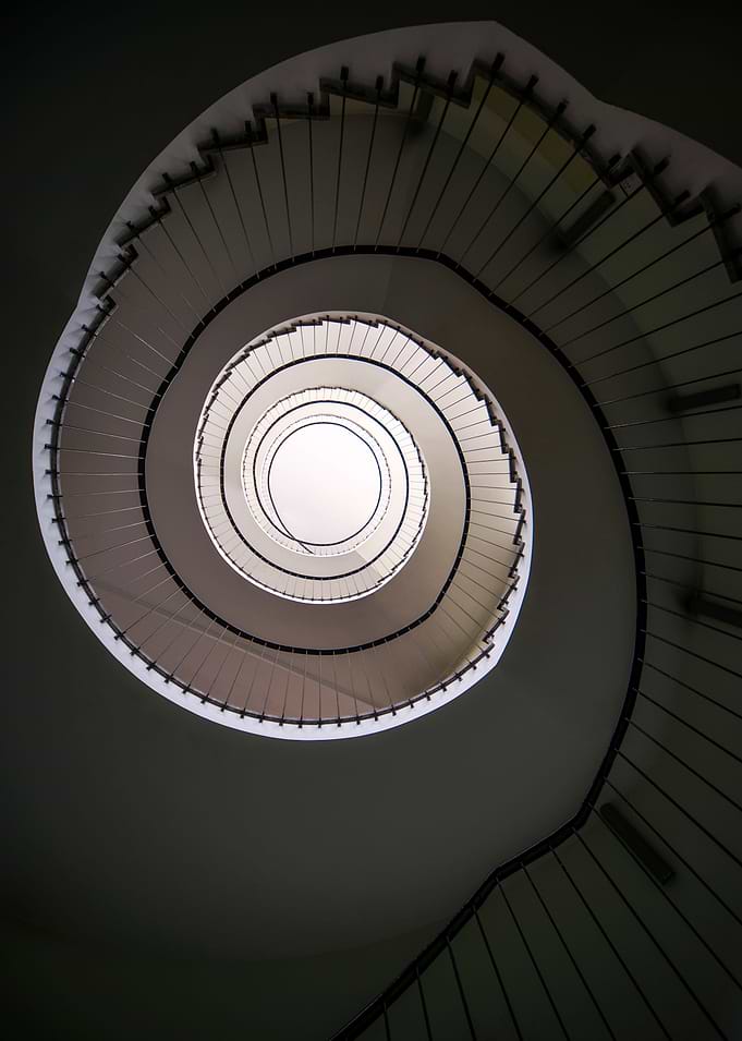 Spiral staircase in brown tones
