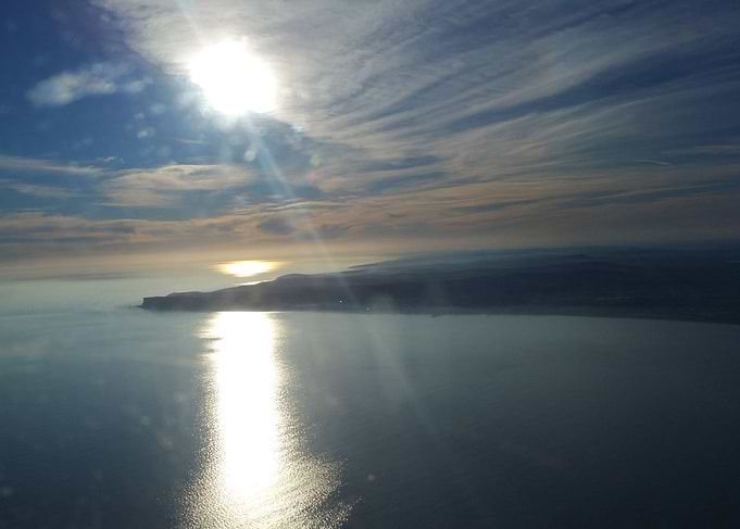 Flying along Englands south coast (Beachy Head) in beau ...