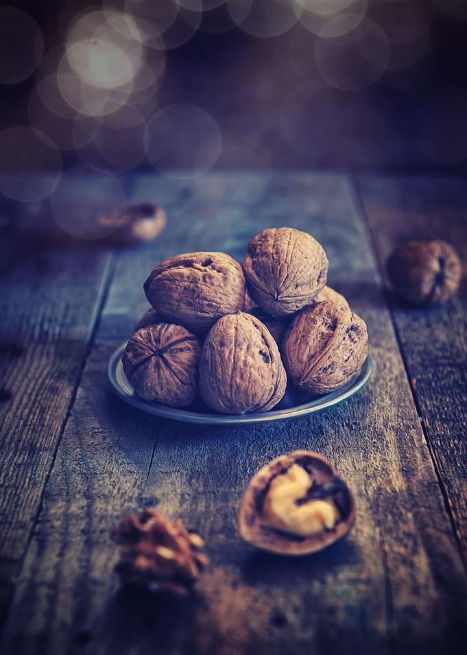 Walnuts on wood table