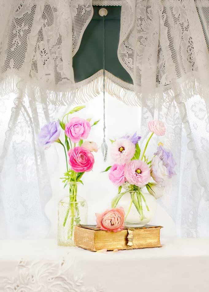 Ranunculus and Circa 1886 Bible in Vintage Window