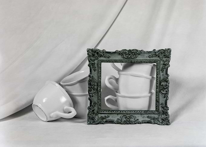 Six framed cups
