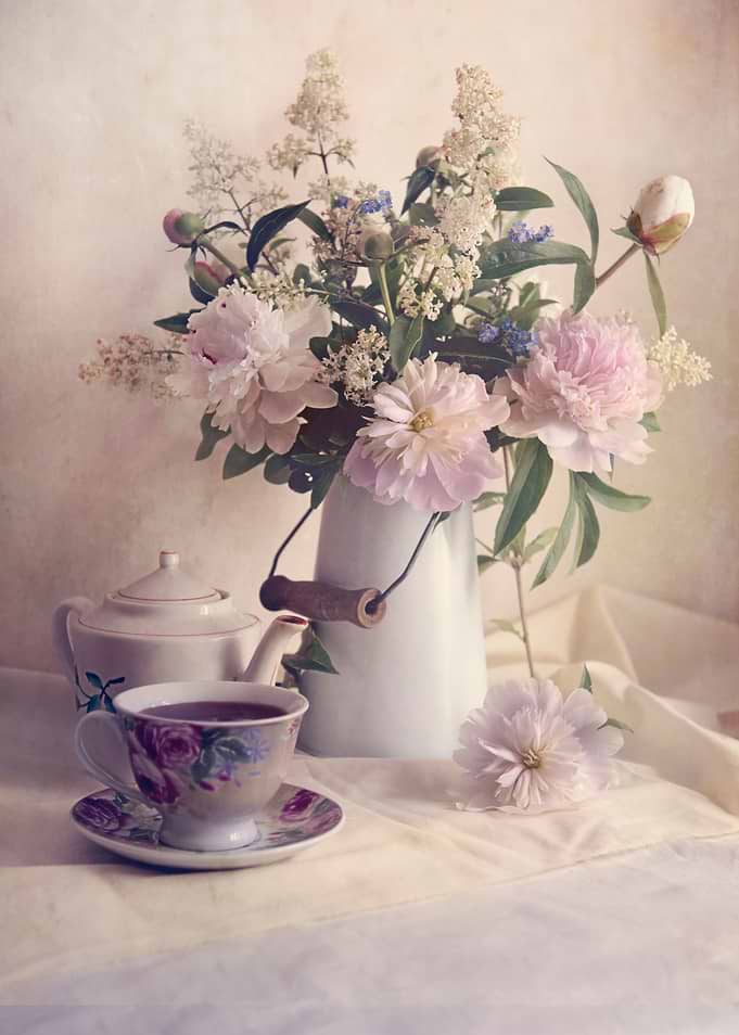 Still life with fresh flowers and teacup