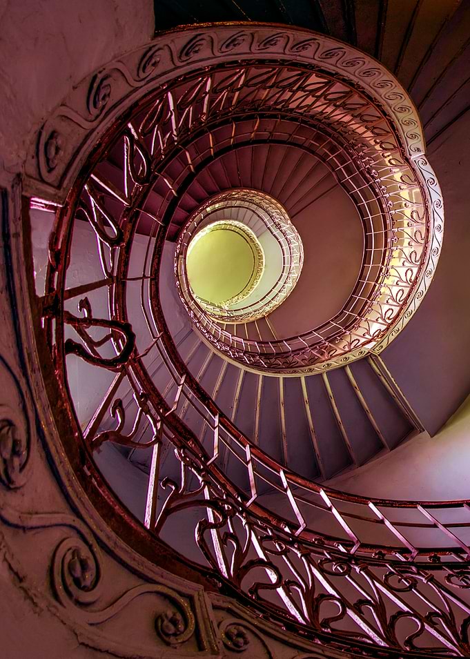 Spiral staircase in red and yellow