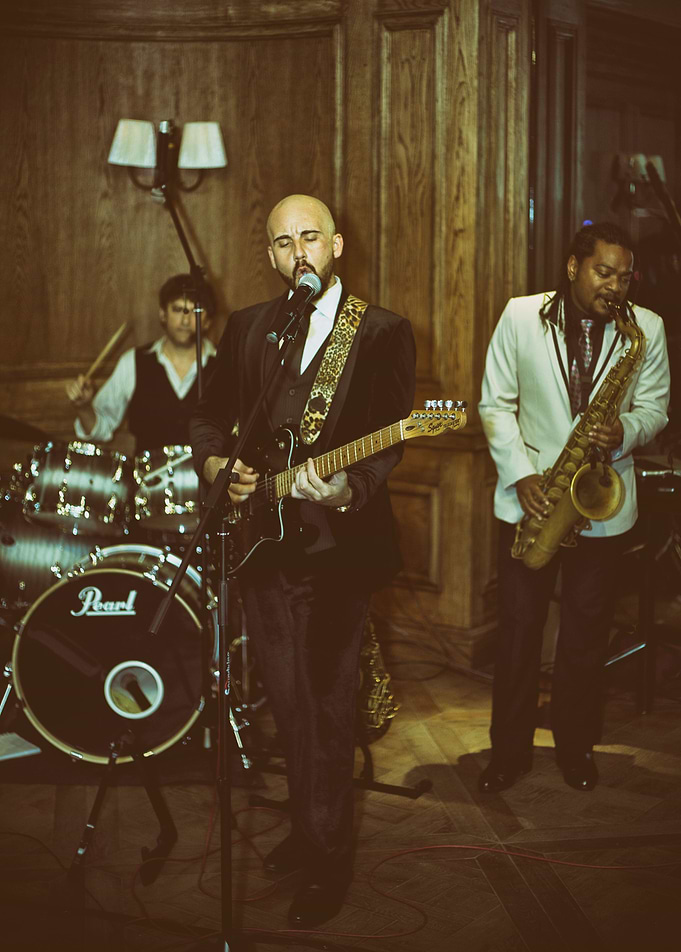 Group of musician performing in a classy bar
