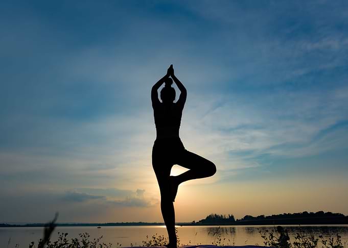 Silhouette beautiful women yoga in nature.