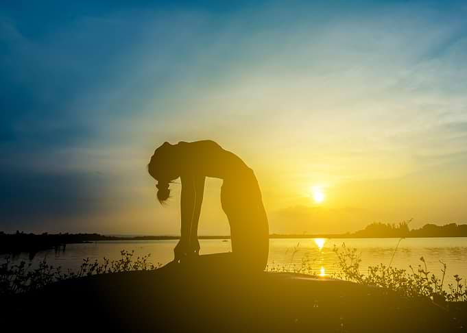Silhouette beautiful women yoga in nature.