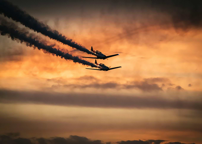 plane in the sunset