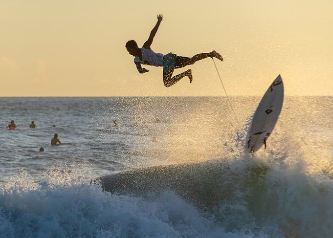 surfer launched into sea
