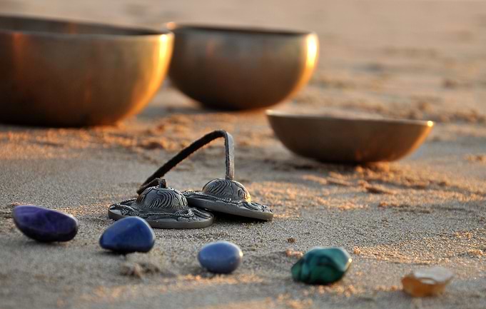 Singing bowls on the beach