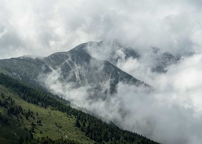 Clouds mountain colliding