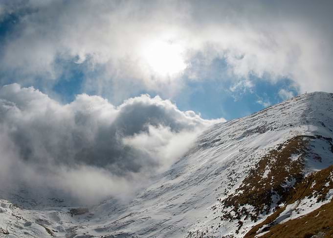 Storm reaching a mountain