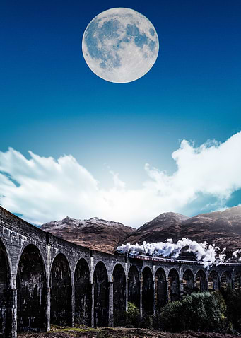 Moon over the train