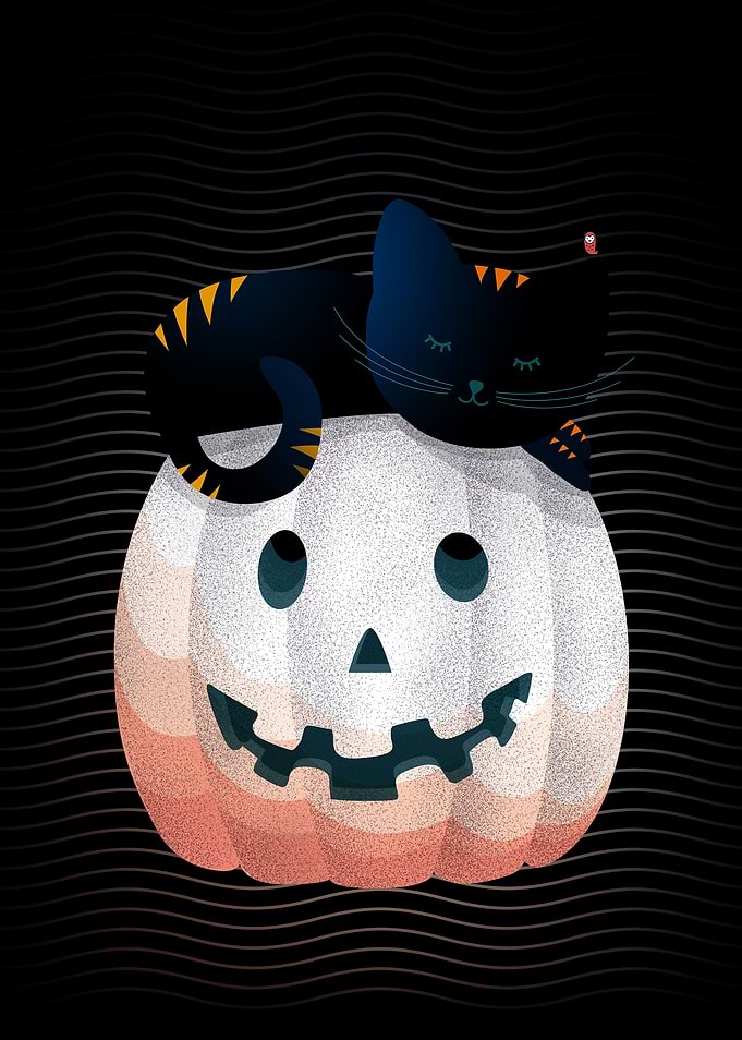 Cat on Halloween pumpkin