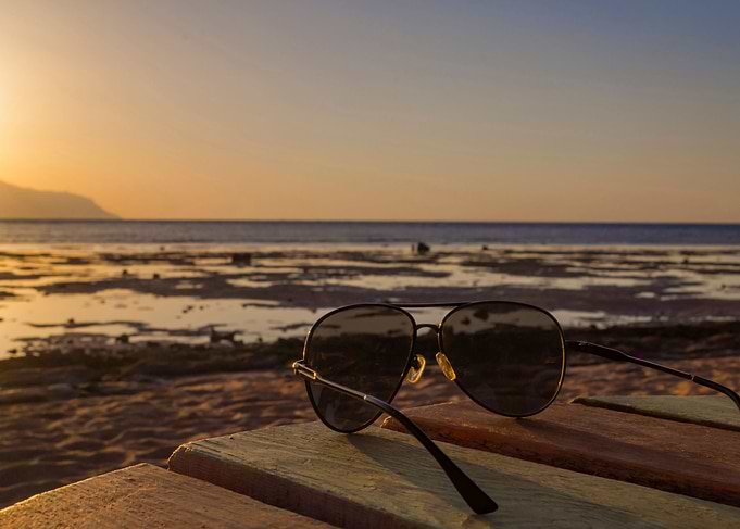 Sunglasses on the wood tab