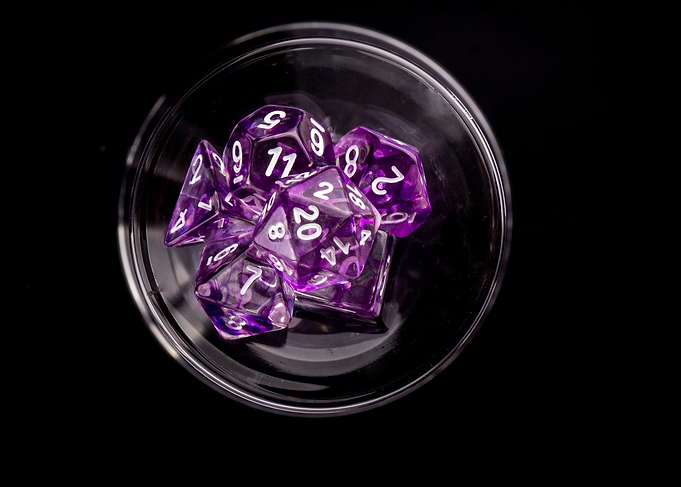 Purple Dice on Glass