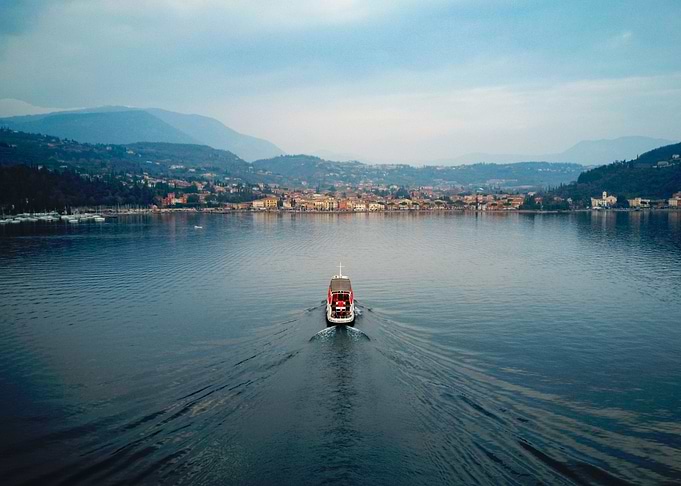 Ship sailing on a lake