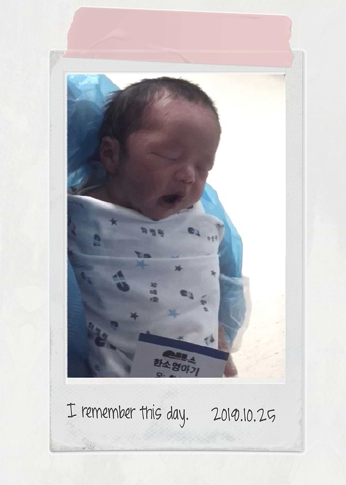 Baby with polaroid