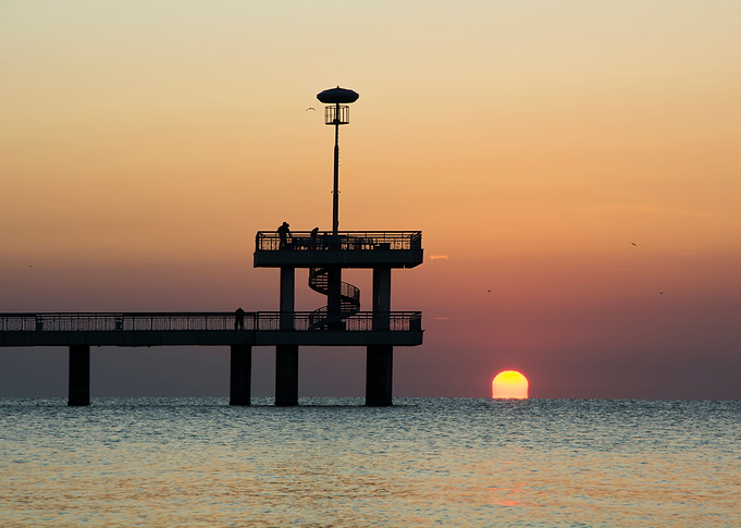 Orange sunrise and bridge