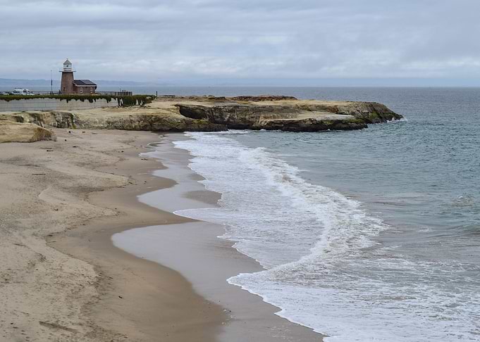 Lighthouse By The Sea