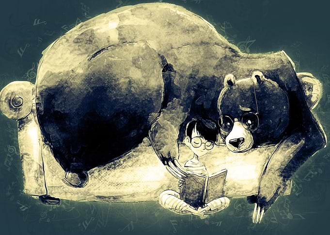 Reading boy with Bear