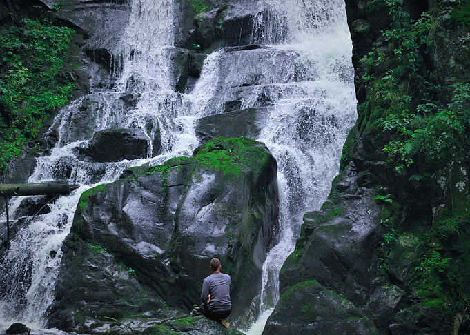 Next to a waterfall