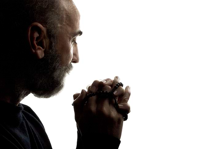 Old man prayer rosary whit