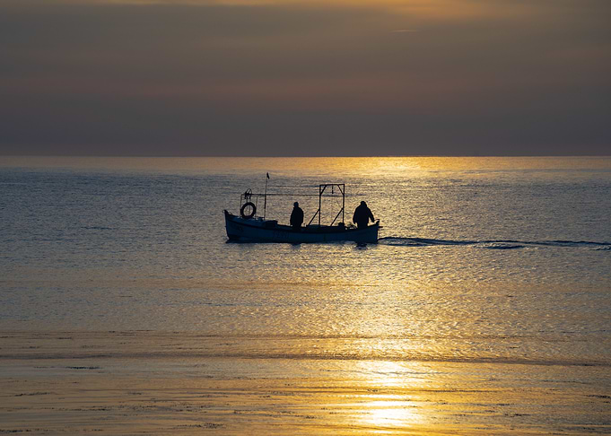 Fishermen at sunrise