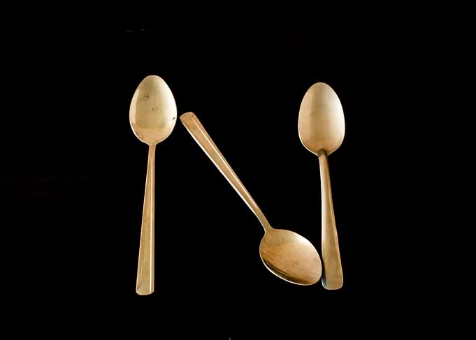 Letter N made of spoons