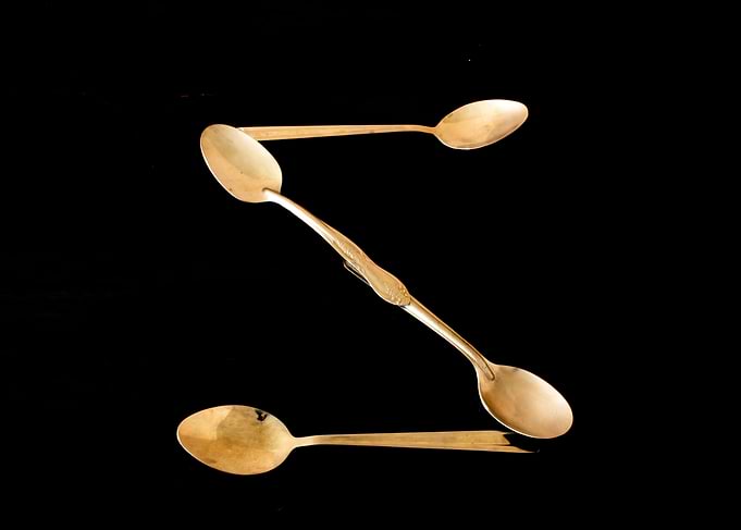 Letter S made of spoons