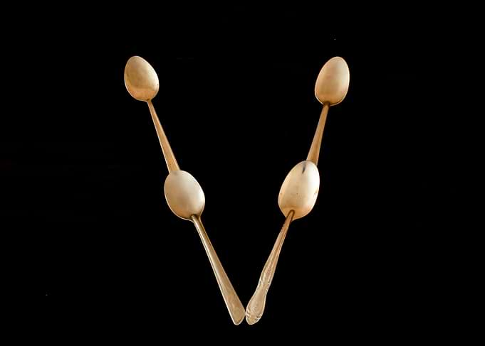 Letter V made of spoons