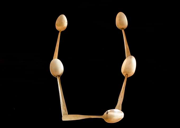 Letter U made of spoons