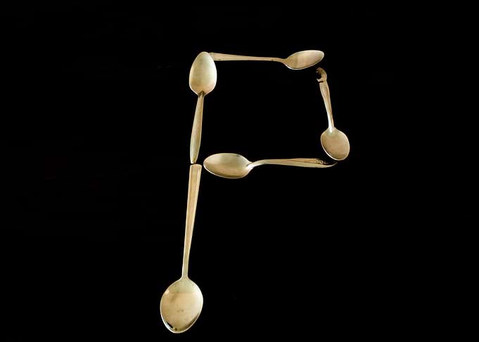 Letter P made of spoons